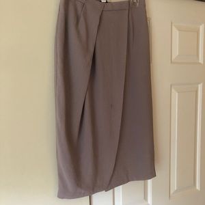 DVF wrap skirt tan with a hint of purple. Size 8